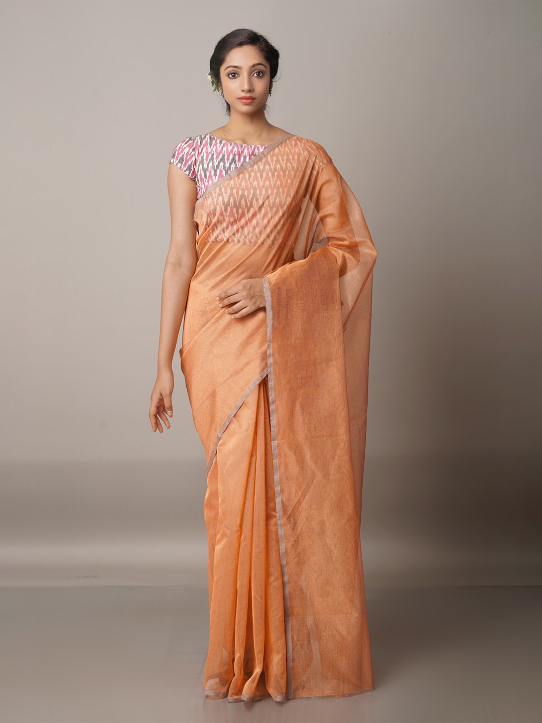 

Unnati Silks Orange Woven Design Zari Net Banarasi Saree
