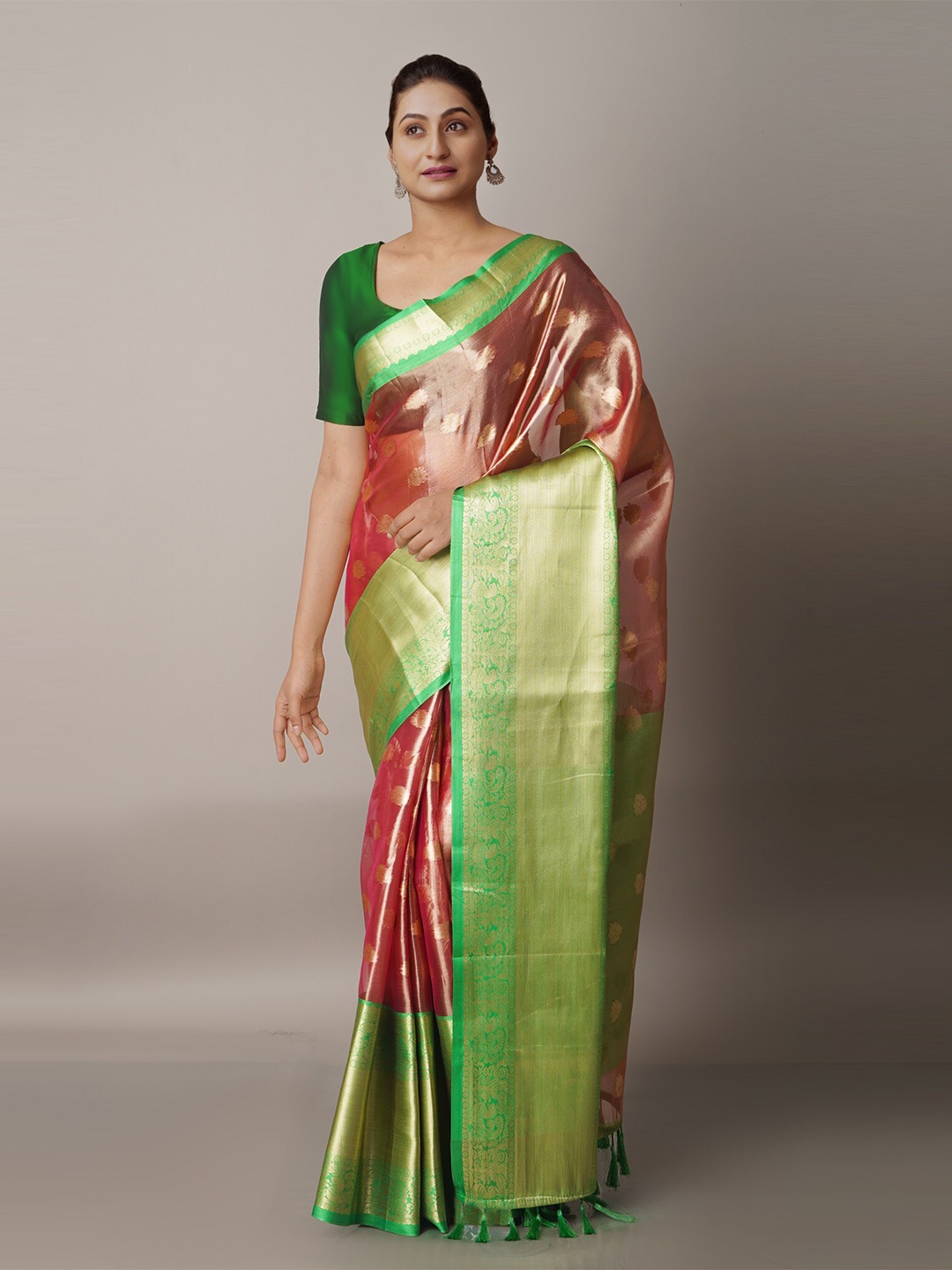 

Unnati Silks Pink & Green Ethnic Motifs Zari Organza Banarasi Saree