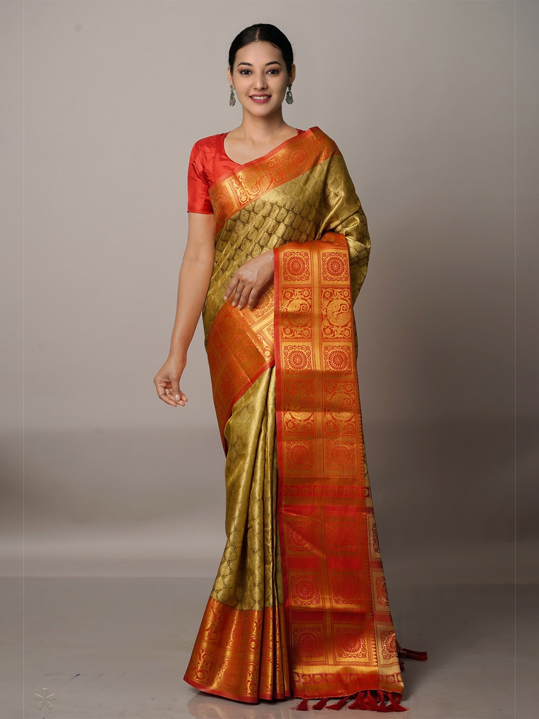 

Unnati Silks Orange & Gold-Toned Ethnic Motifs Zari Silk Blend Banarasi Saree