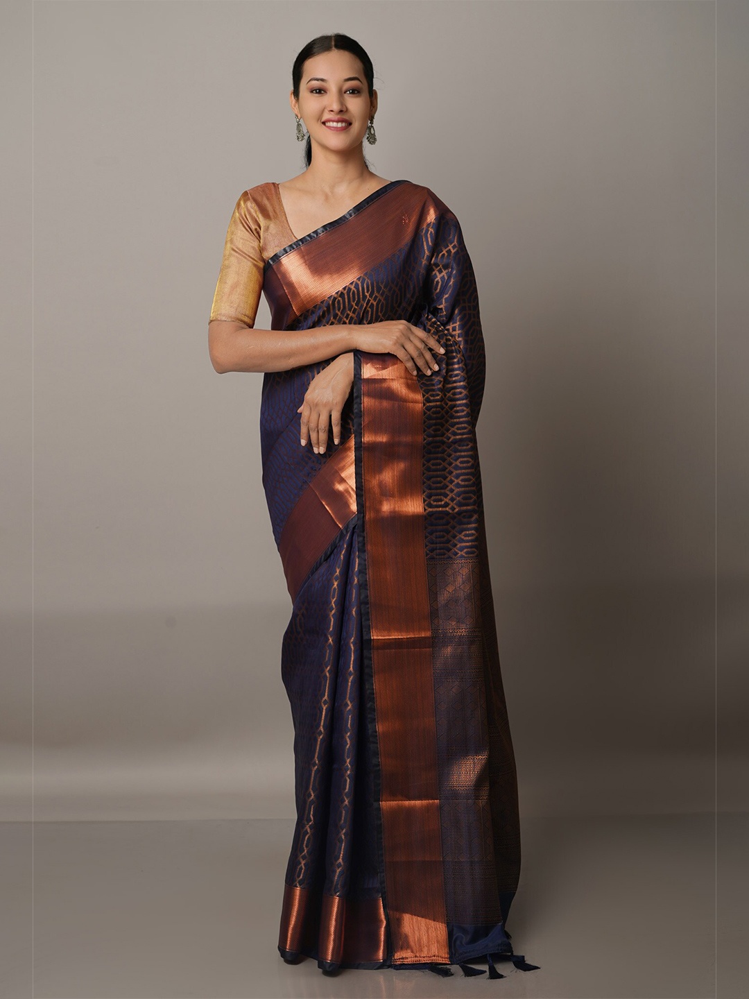 

Unnati Silks Navy Blue & Copper-Toned Ethnic Motifs Zari Silk Blend Banarasi Saree