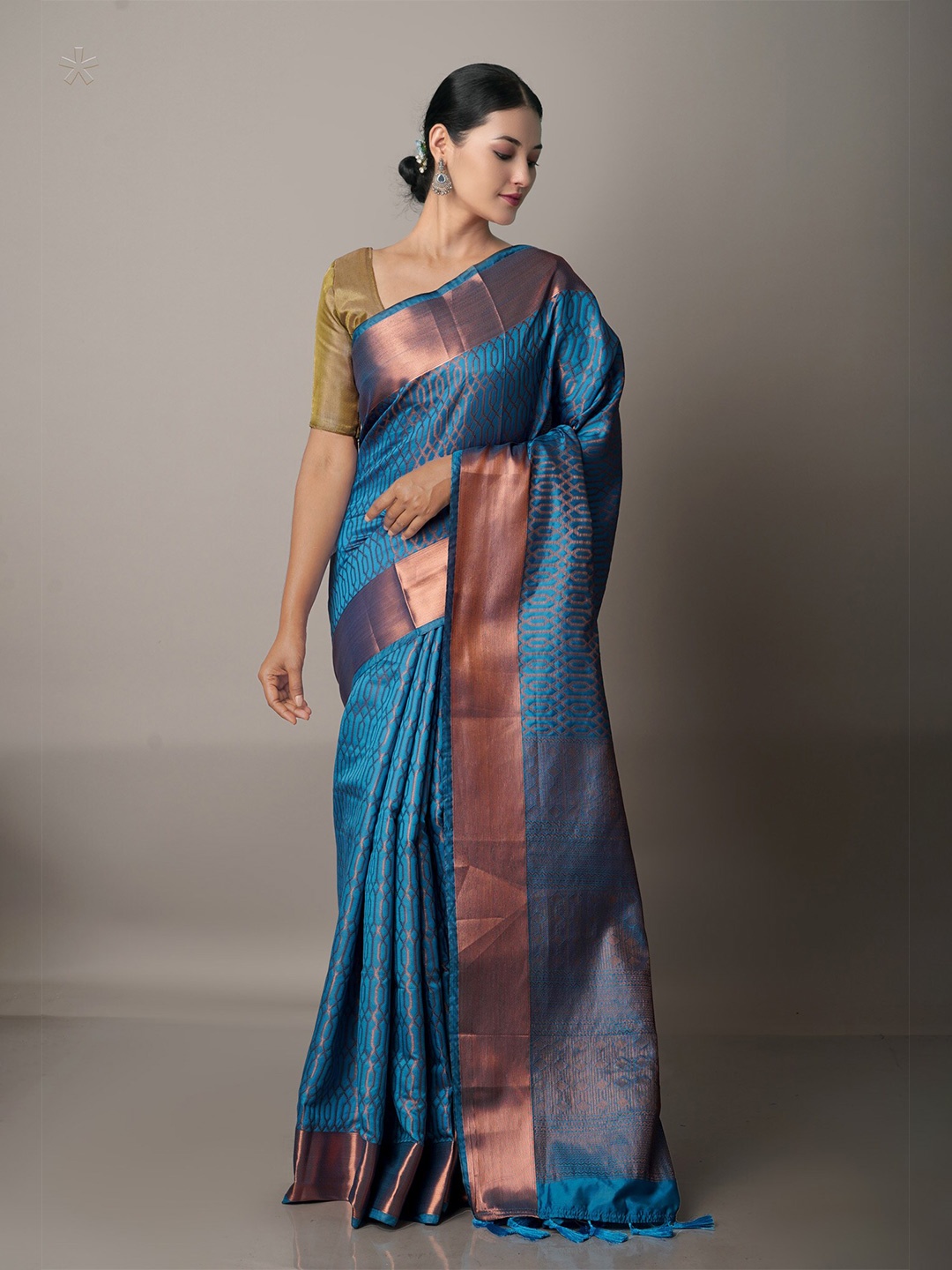 

Unnati Silks Blue & Copper-Toned Ethnic Motifs Zari Silk Blend Banarasi Saree