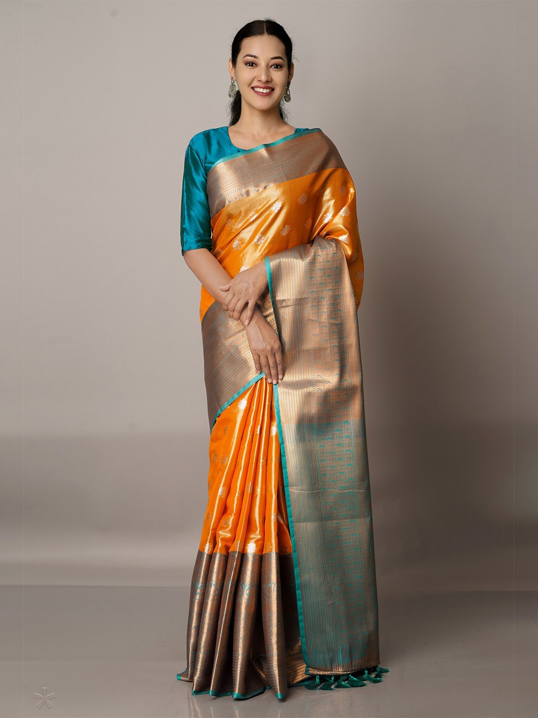 

Unnati Silks Orange & Green Woven Design Zari Silk Blend Banarasi Saree
