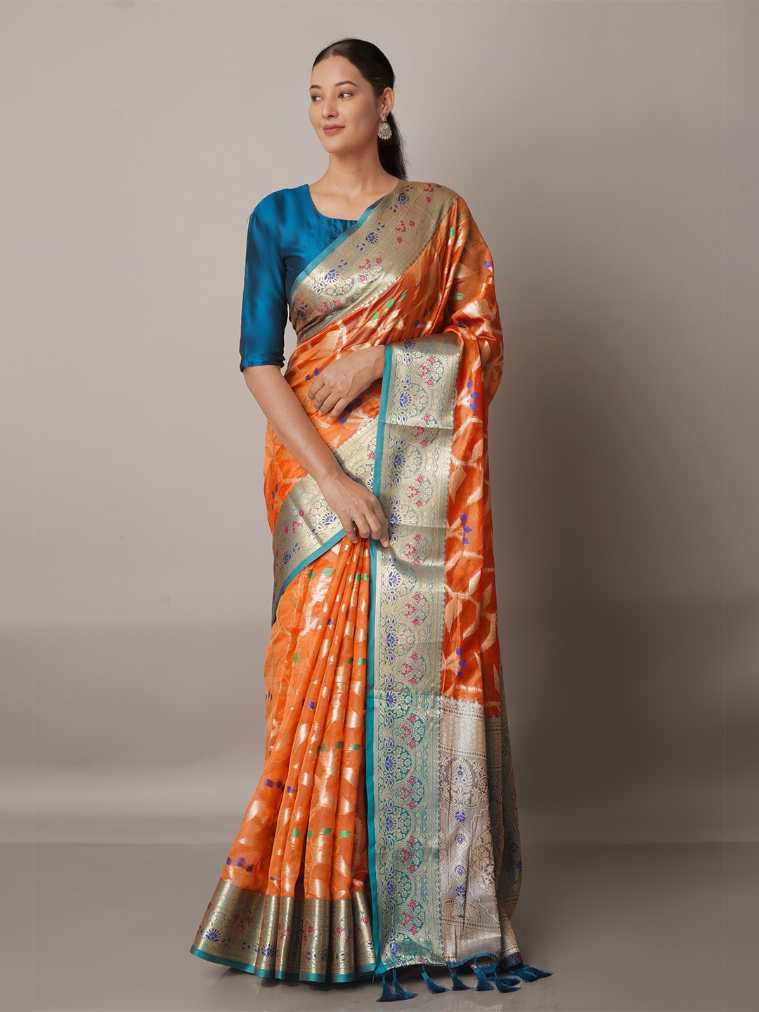 

Unnati Silks Orange & Green Woven Design Zari Silk Blend Banarasi Saree