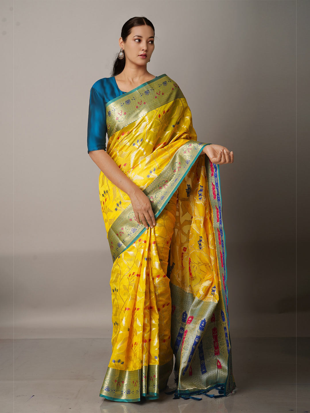 

Unnati Silks Yellow & Blue Woven Design Silk Blend Banarasi Saree