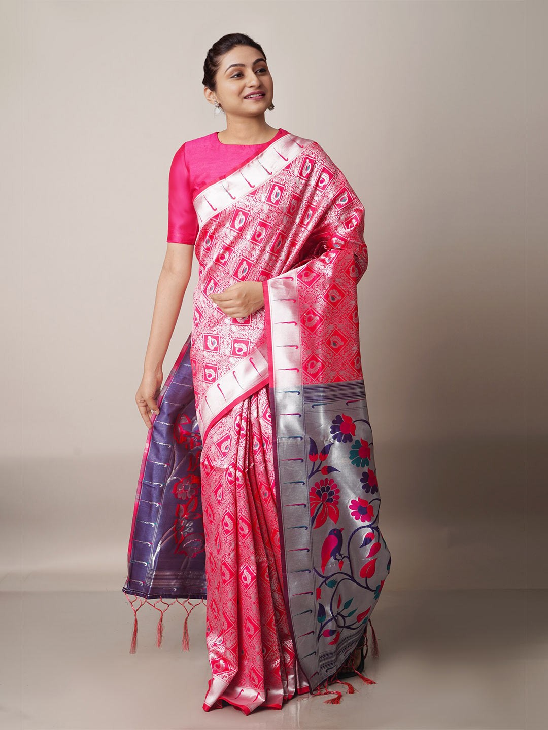 

Unnati Silks Pink & Purple Ethnic Motifs Zari Silk Blend Paithani Saree