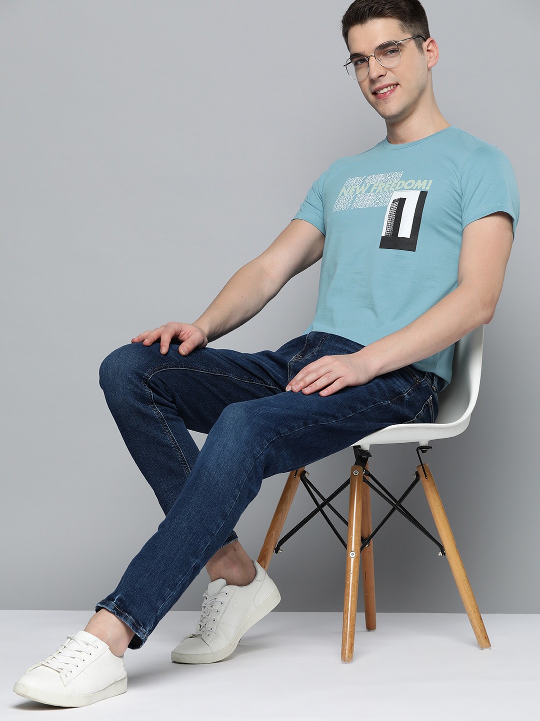 

Mast & Harbour Men Blue & White Typography Printed T-shirt