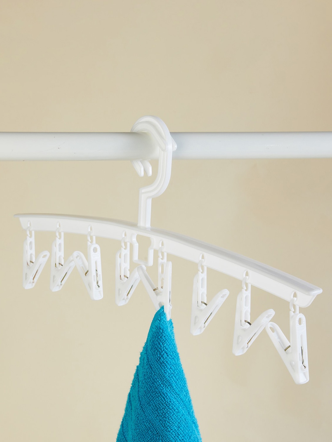 

Home Centre White Solid Hanger with 8 Pegs