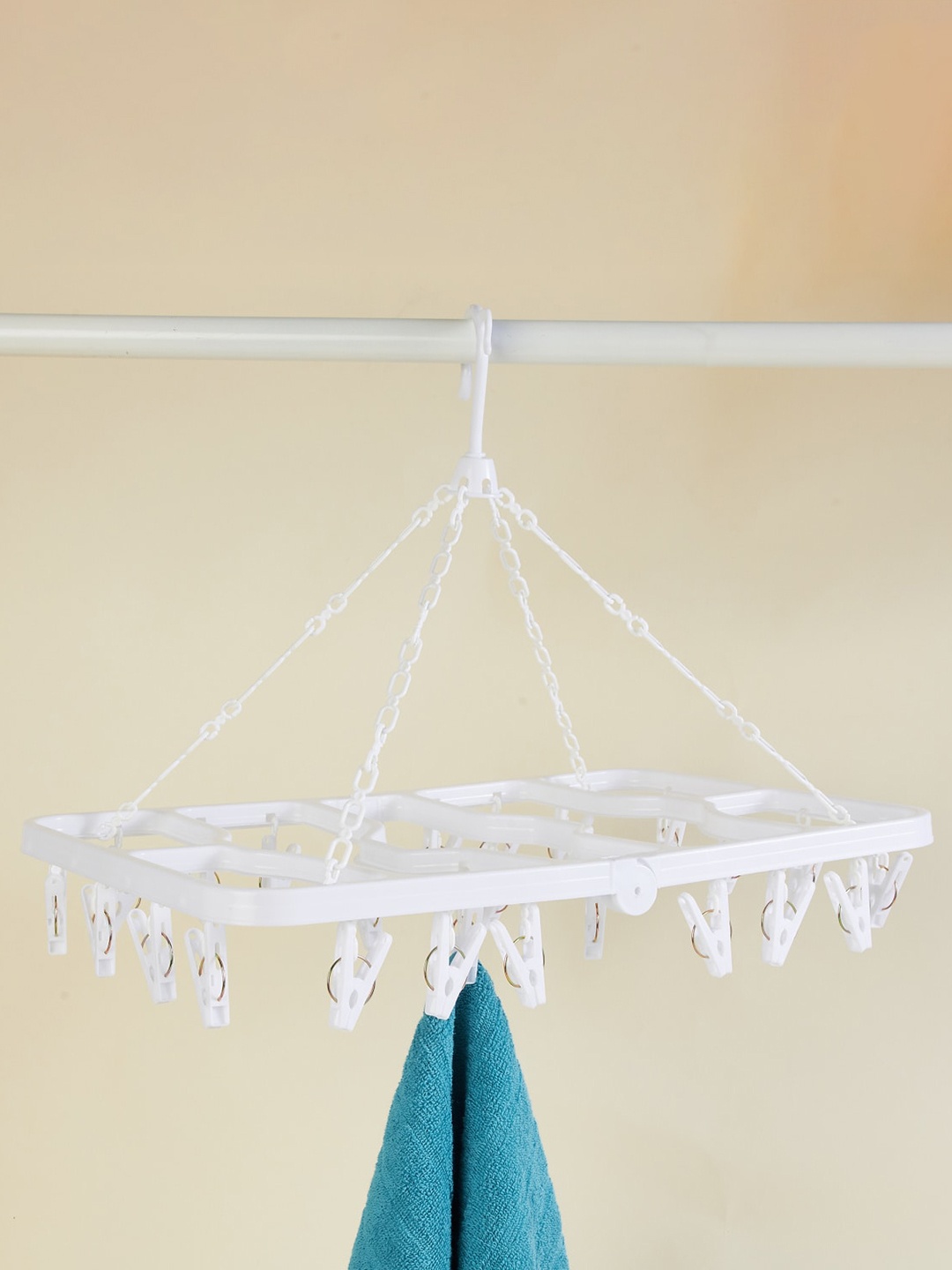 

Home Centre White Polypropylene Rectangular Hanger with 24 Pegs