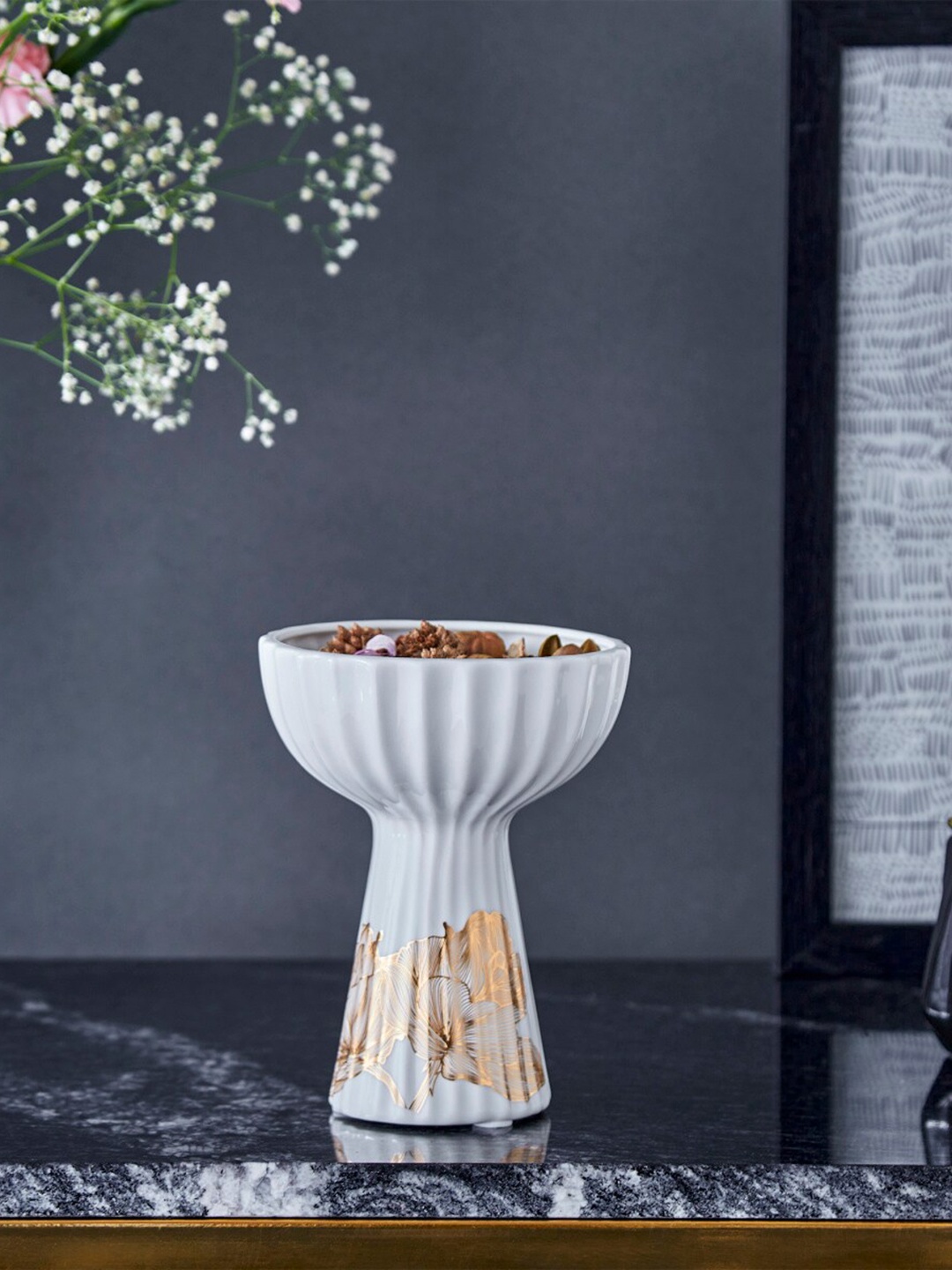 

Home Centre White Printed Ceramic Candle Holder