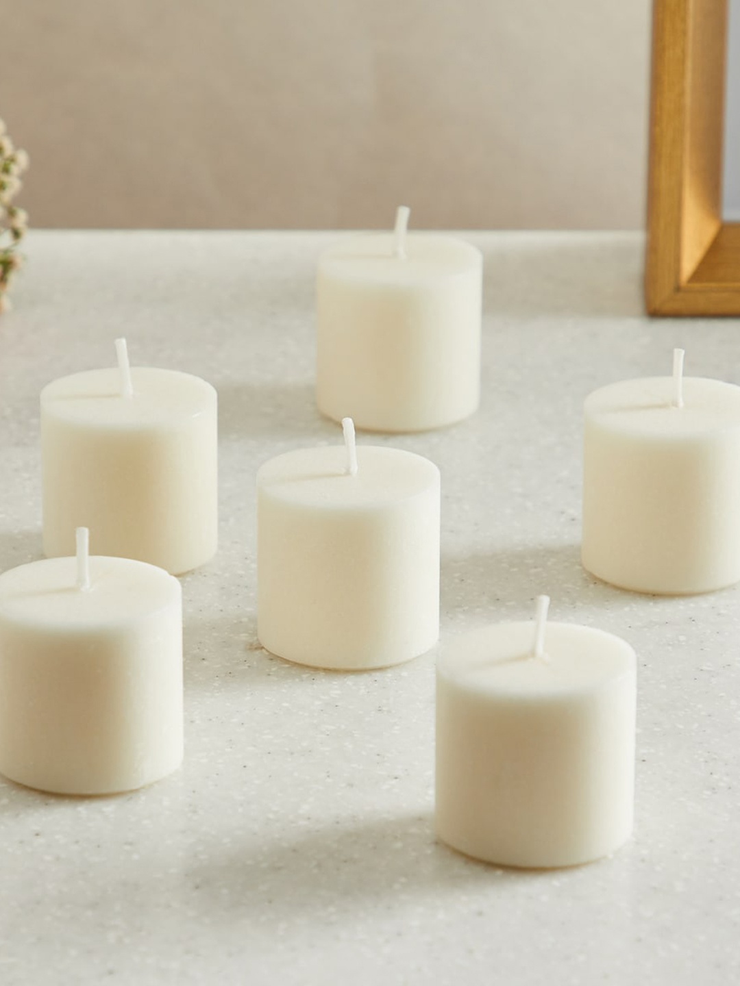 

Home Centre Set Of 6 Vanilla Scented Votive Candles, Off white