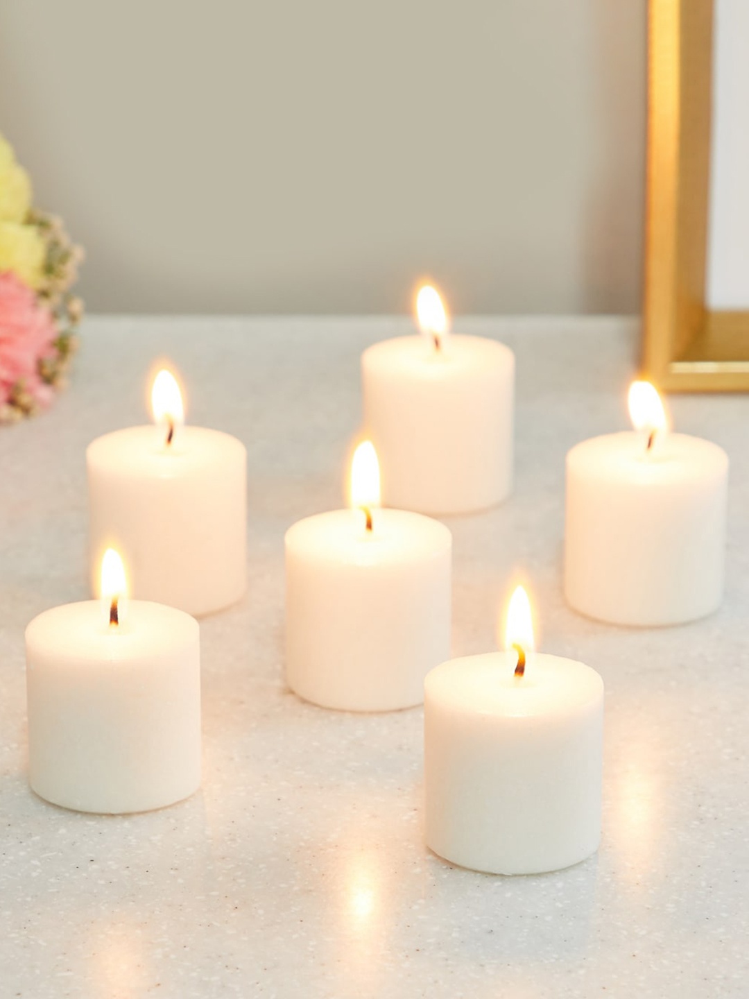 

Home Centre Set Of 6 Lily Scented Votive Candles, White