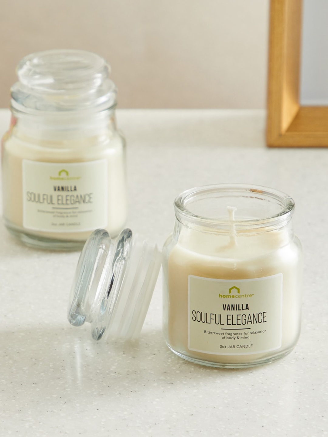 

Home Centre Set Of 2 Off White Vanilla Scented Jar Candles