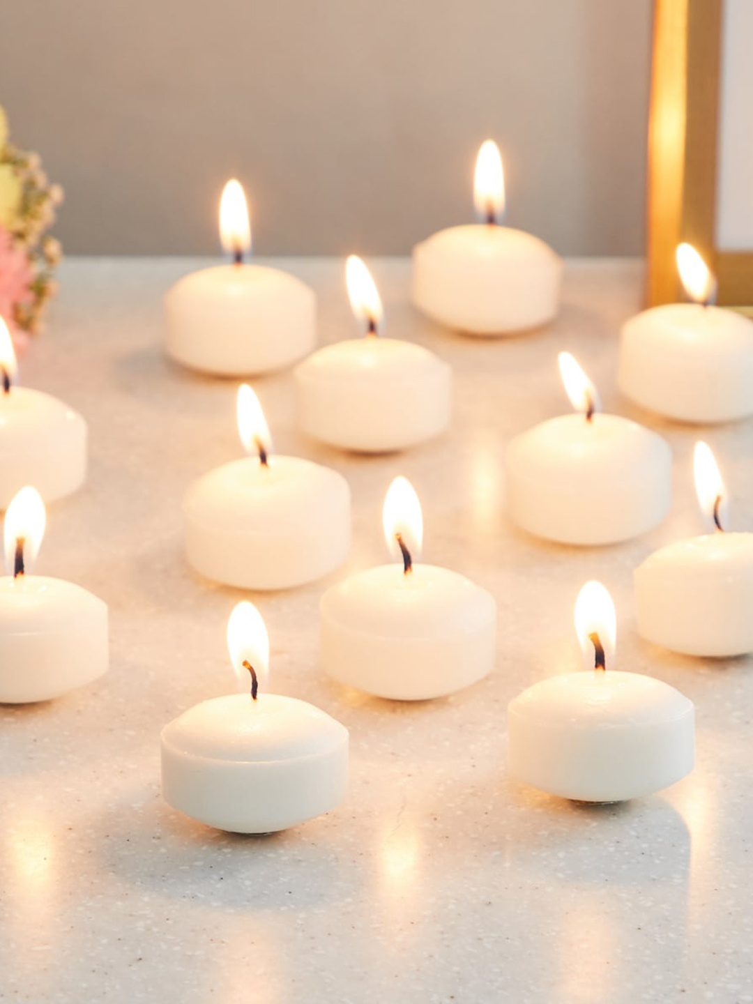 

Home Centre Set of 12 Lily Scented Floating Candles, White