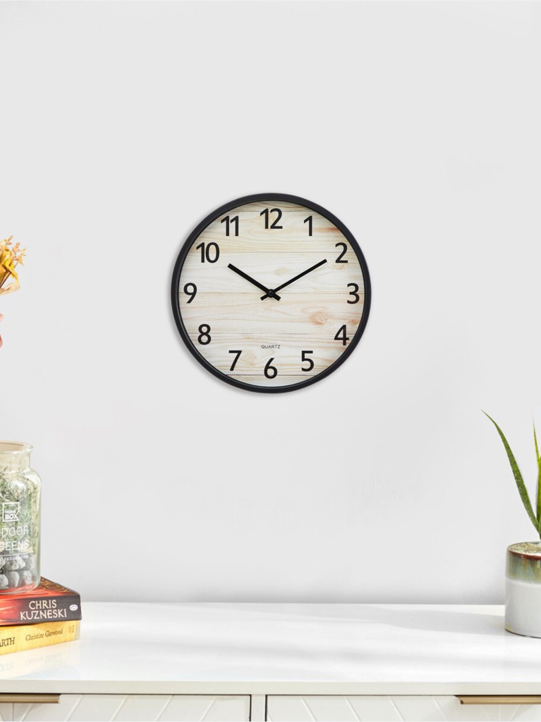 

Home Centre Brown & Black Printed Contemporary Wall Clock