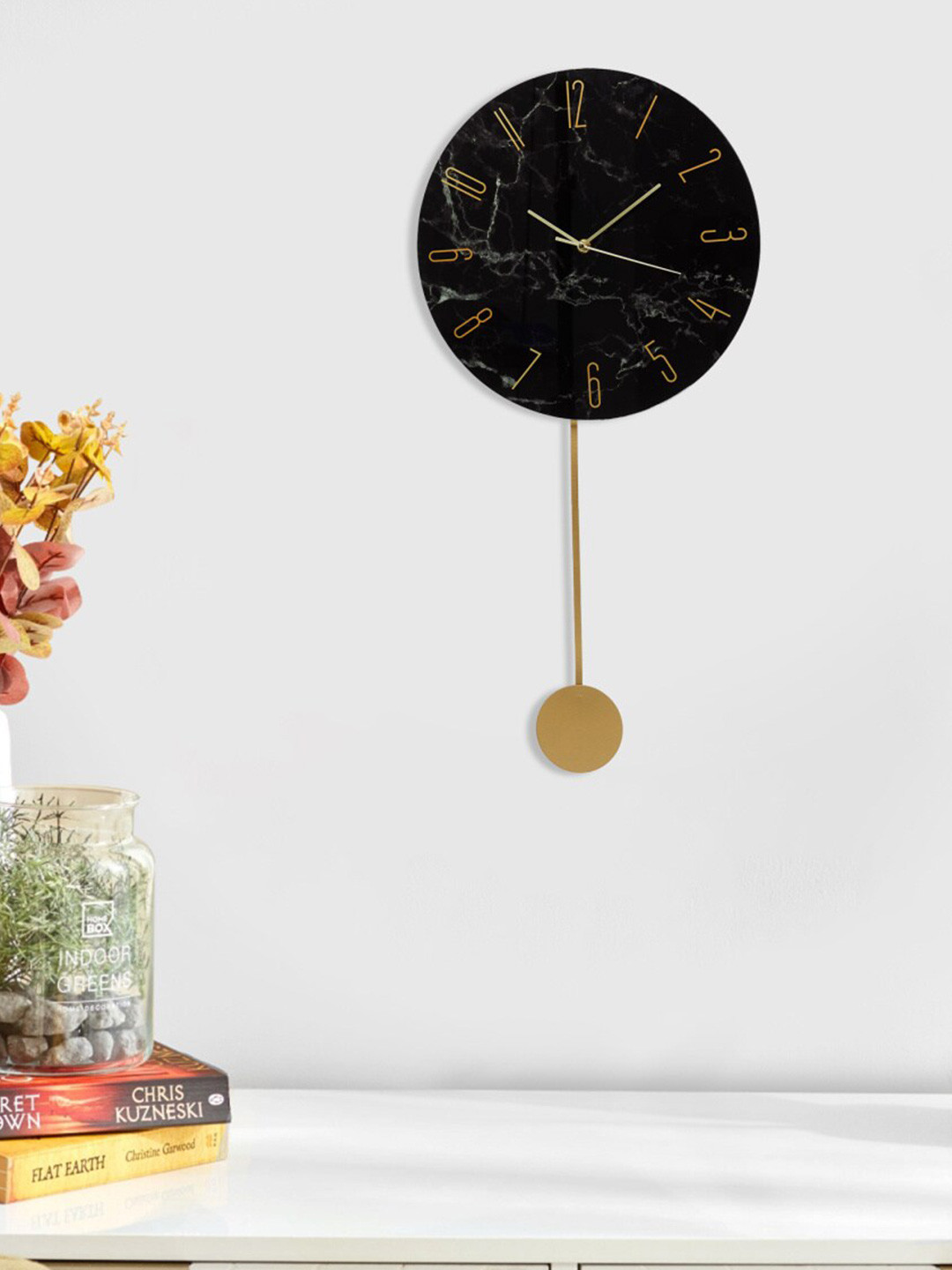 

Home Centre Black & Gold-Toned Textured Contemporary Wall Clock