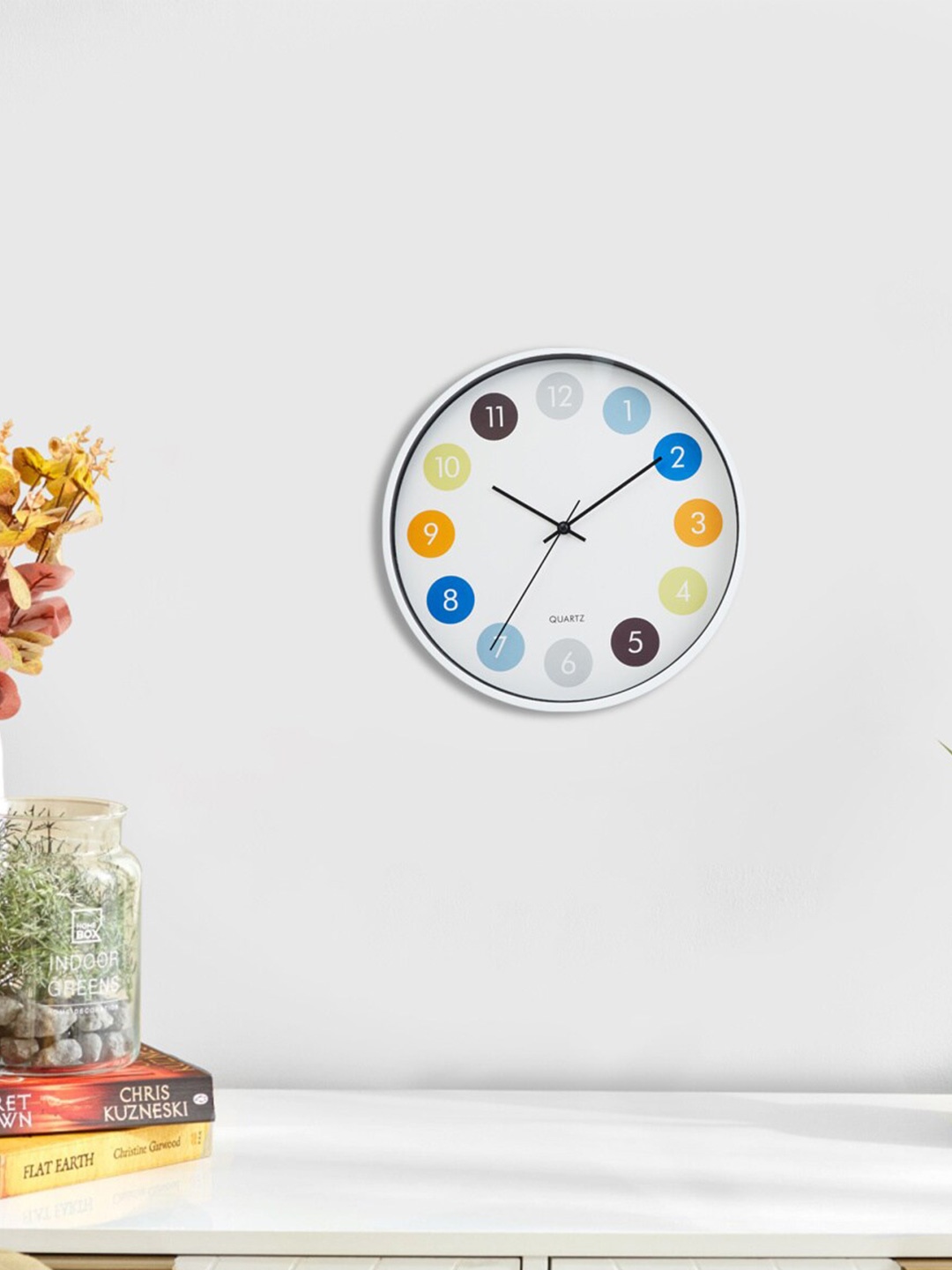 

Home Centre White & Blue Printed Contemporary Wall Clock