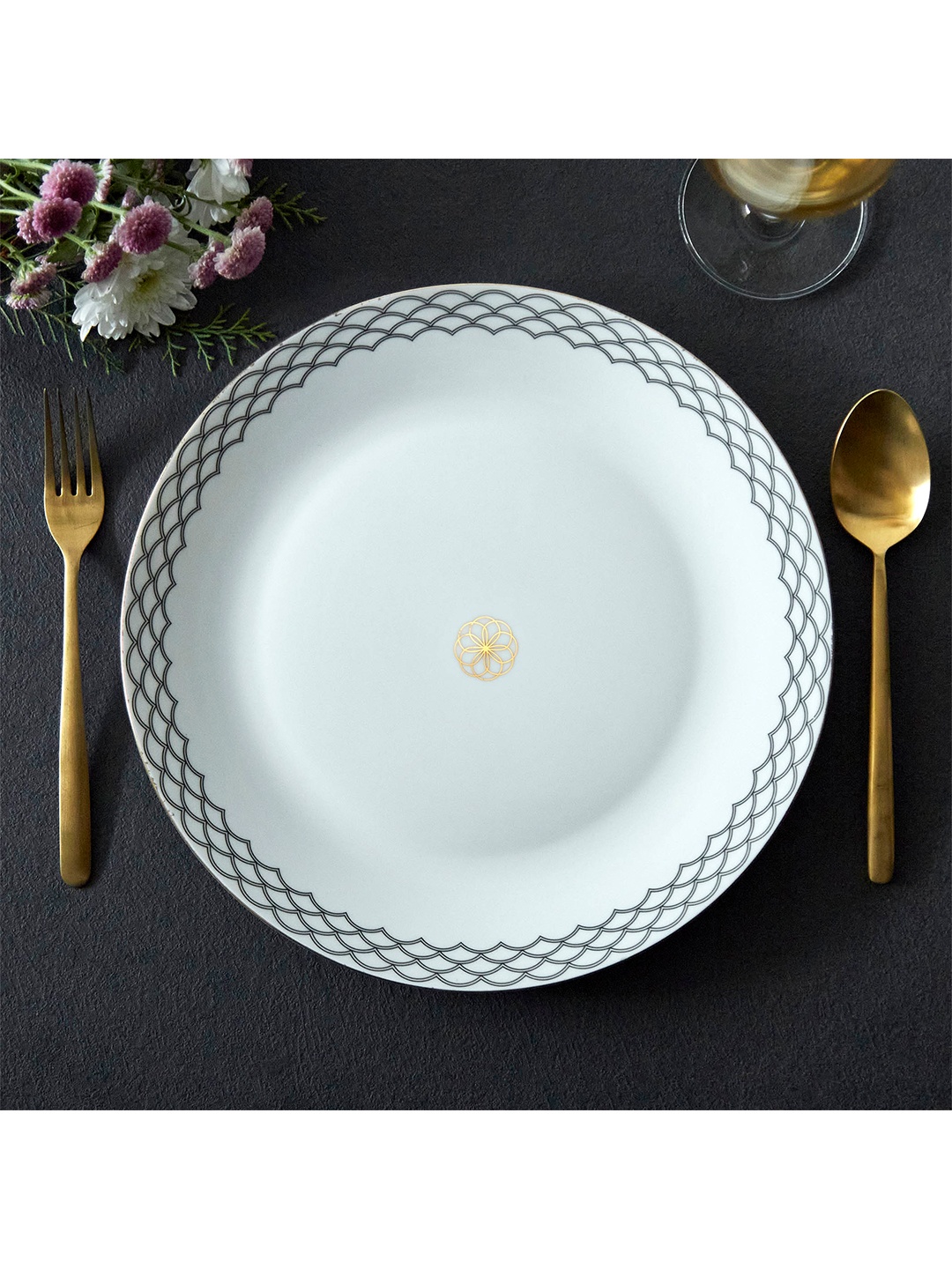 

Home Centre White & Black 1 Pieces Printed Bone China Glossy Plates