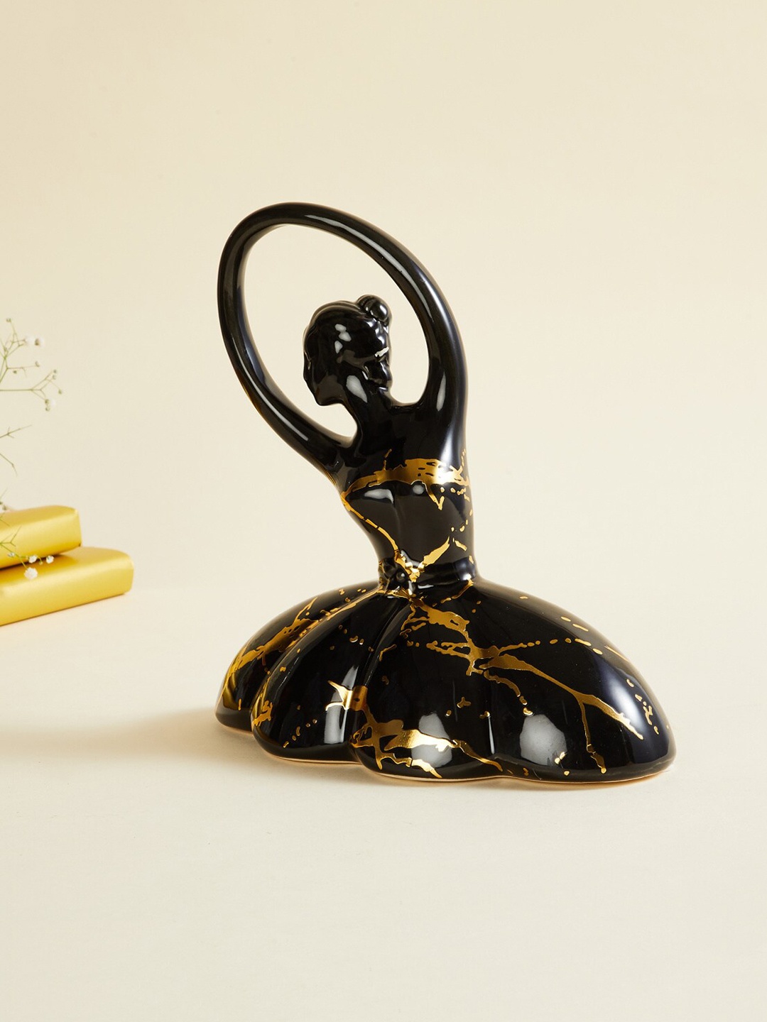 

Home Centre Black & Gold-Coloured Ceramic Dancing Ballerina Showpiece
