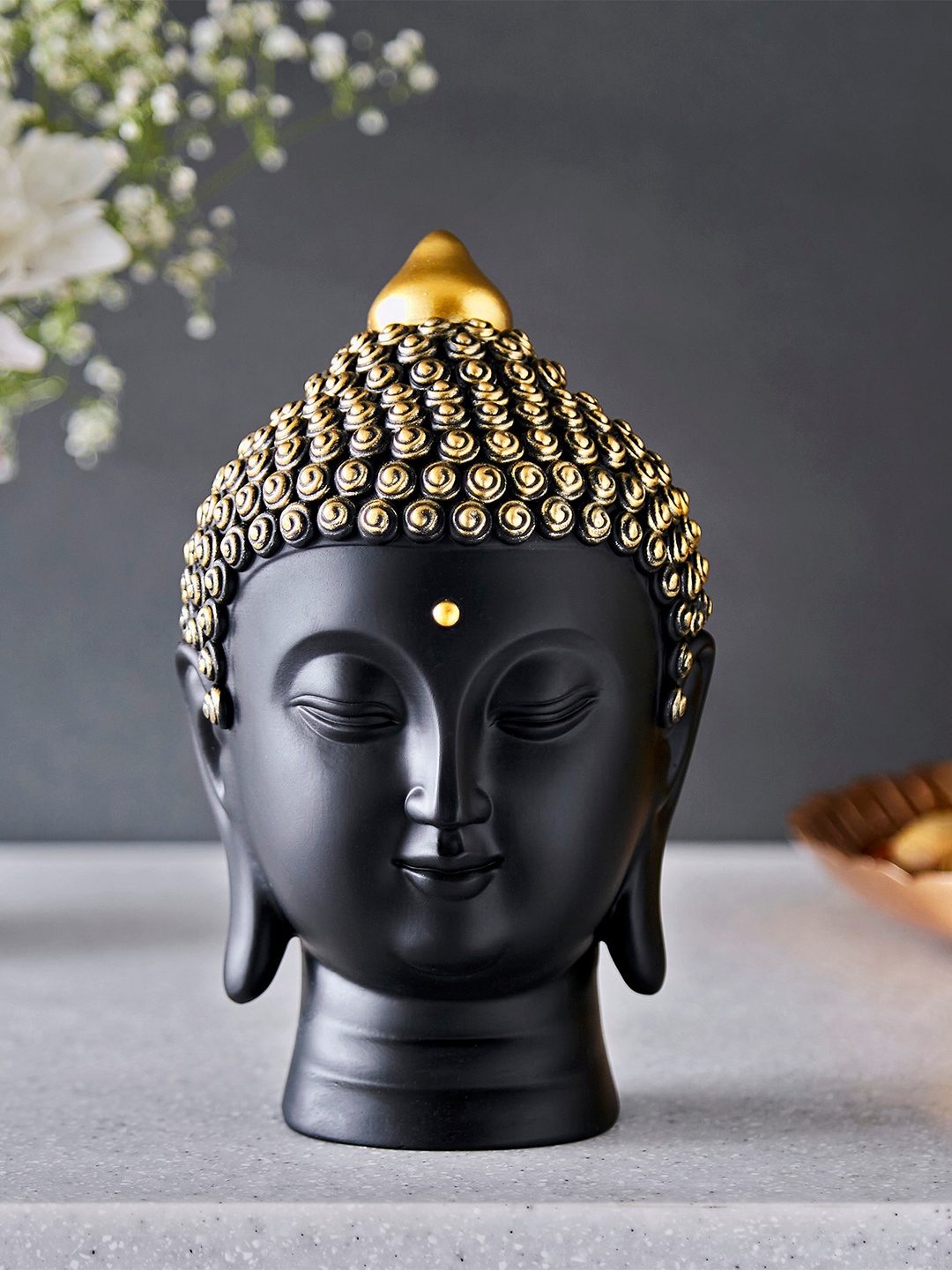 

Home Centre Black & Gold-Toned Buddha Head Figurine Showpieces
