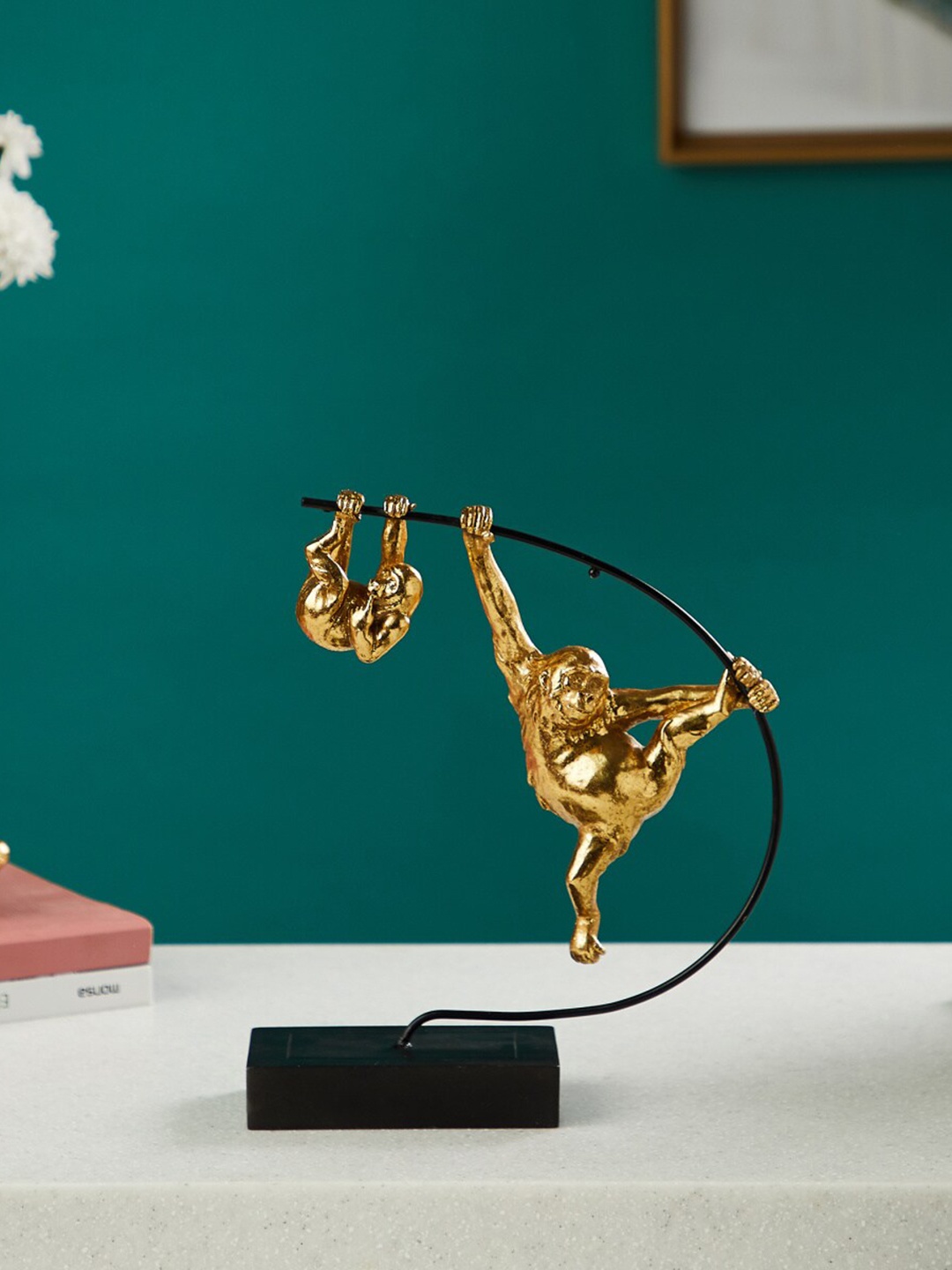 

Home Centre Gold-Toned Hanging Monkey Figurine Showpiece