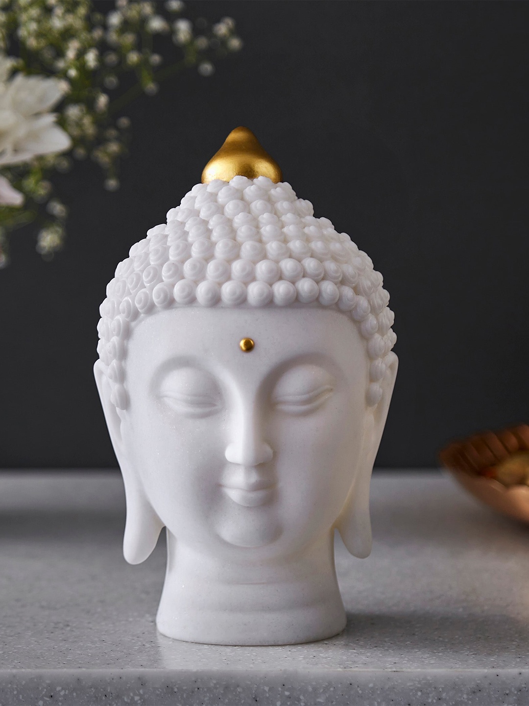 

Home Centre White Buddha Head Figurine Showpieces