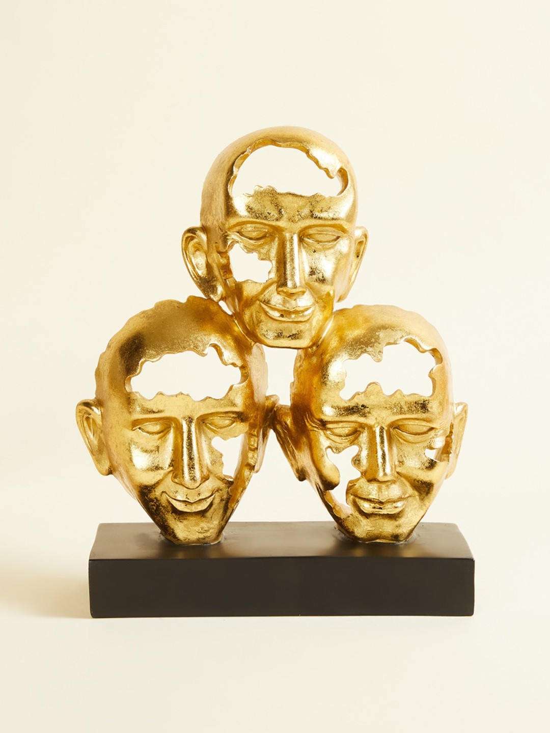 

Home Centre Black & Gold-Coloured Pyramid Shaped Faces Showpieces