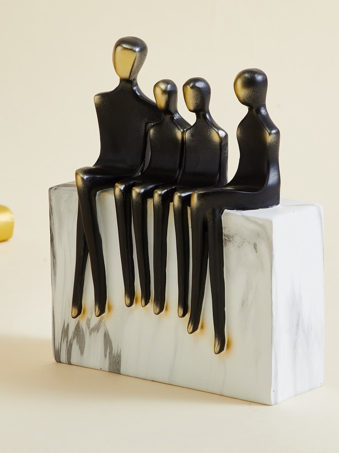 

Home Centre Black & White Family Showpieces