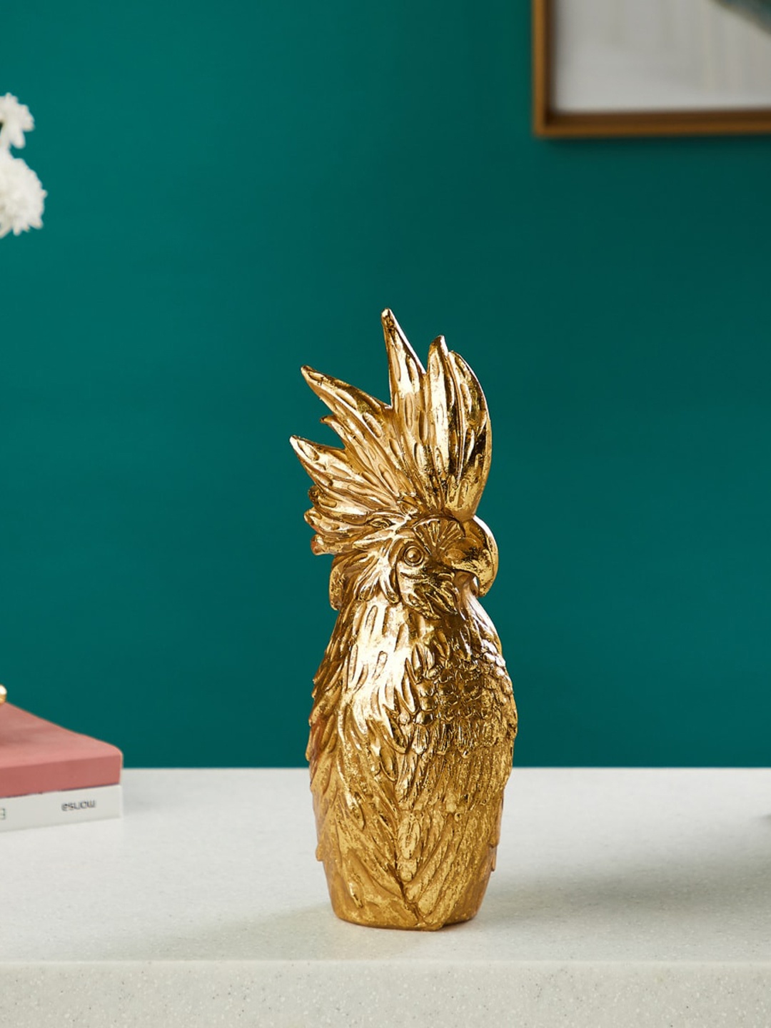 

Home Centre Gold-Toned Textured Parrot Figurine Showpieces