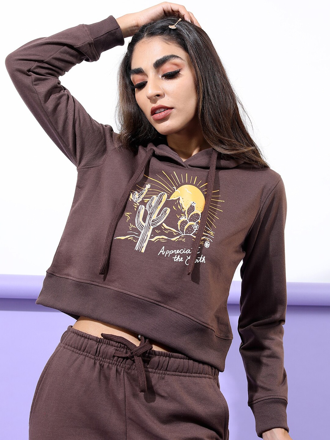 

Tokyo Talkies Women Brown Printed Hooded Sweatshirt