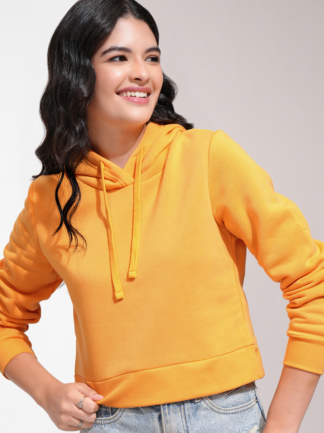 

Tokyo Talkies Women Yellow Hooded Sweatshirt