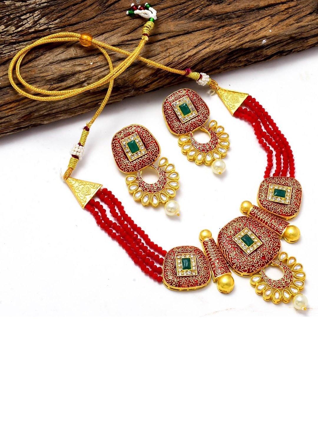 

Jewar Mandi Gold-Plated & Maroon Kundan-Studded & Pearl Beaded Jewellery Set