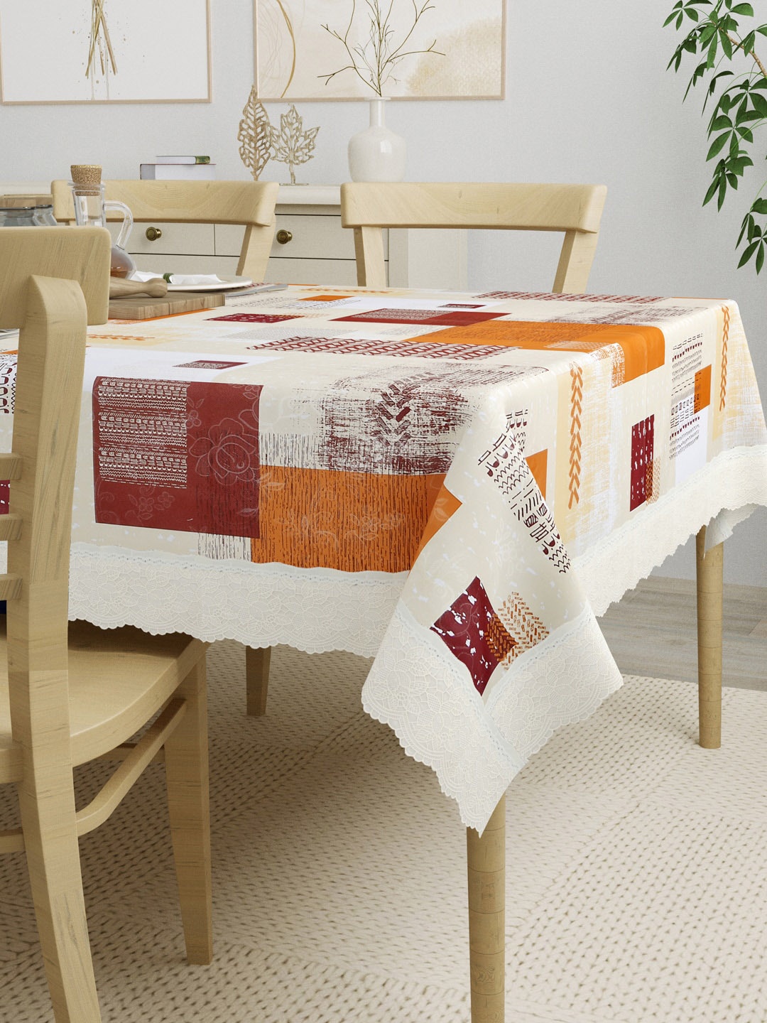 

Clasiko Orange & White Printed 4 Seater Table Cover