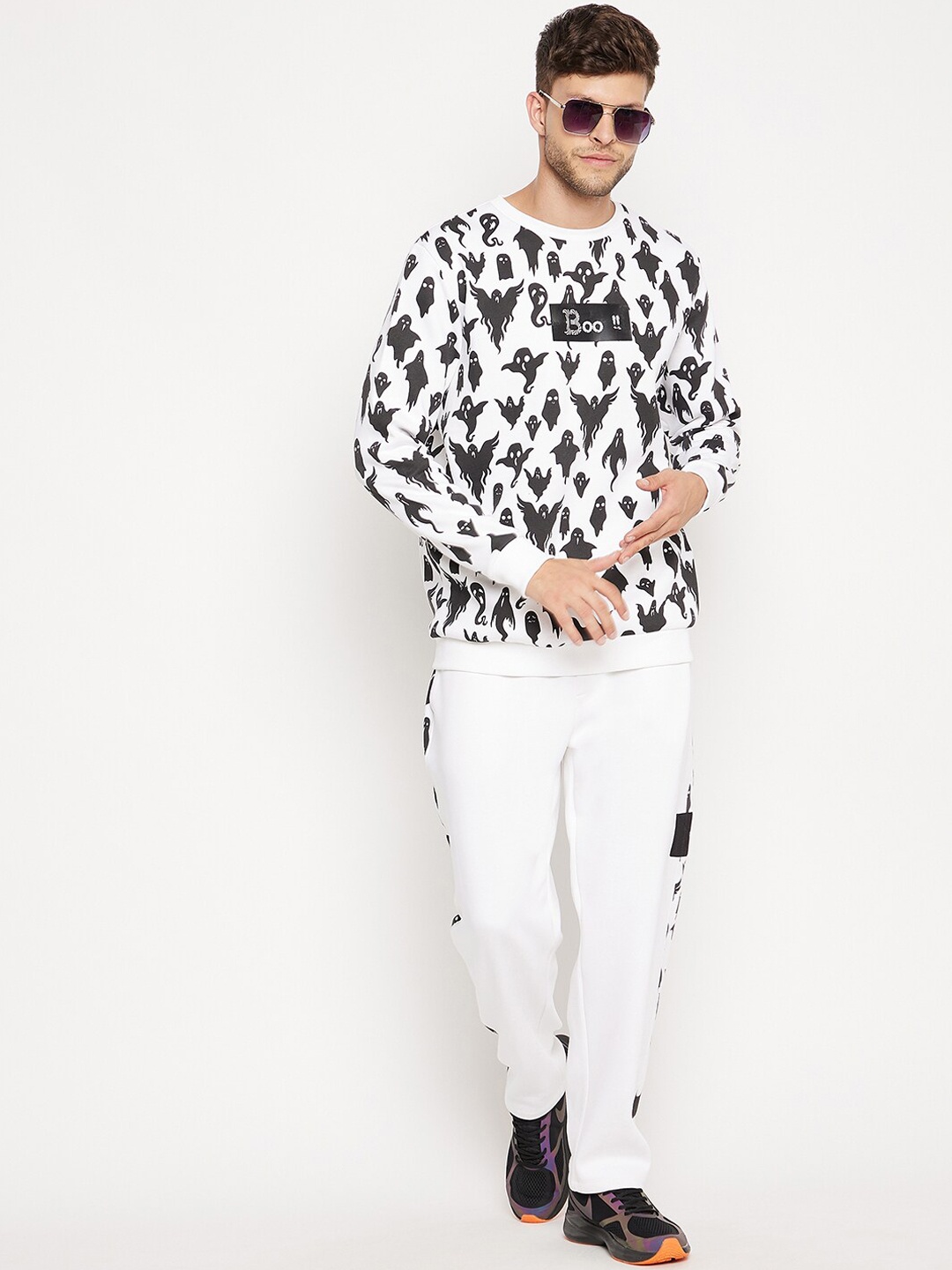 

EDRIO Men White & Black Printed Fleece Tracksuits