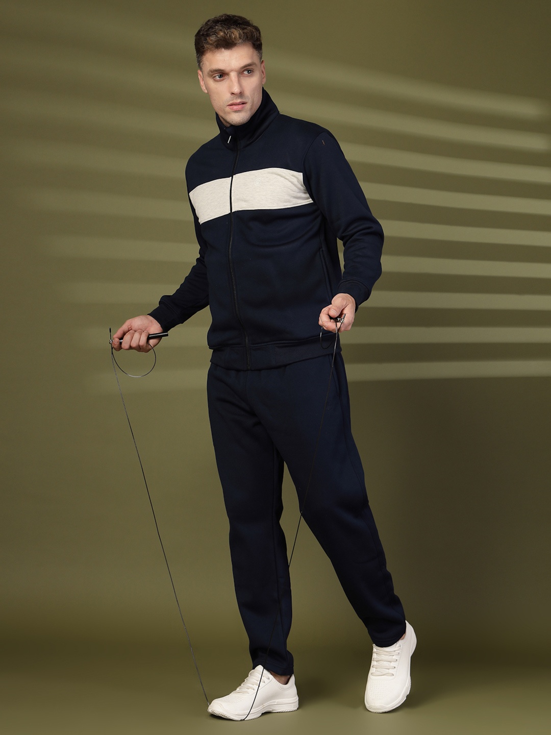 

CHKOKKO Men Navy Blue Solid Tracksuit