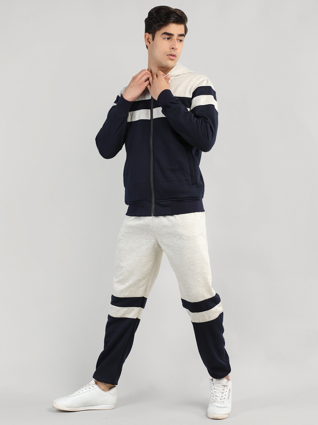 

CHKOKKO Men Off White & Navy Blue Colourblocked Cotton Tracksuits