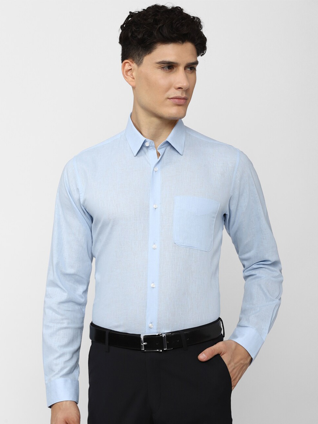 

Peter England Men Blue Solid Formal Shirt