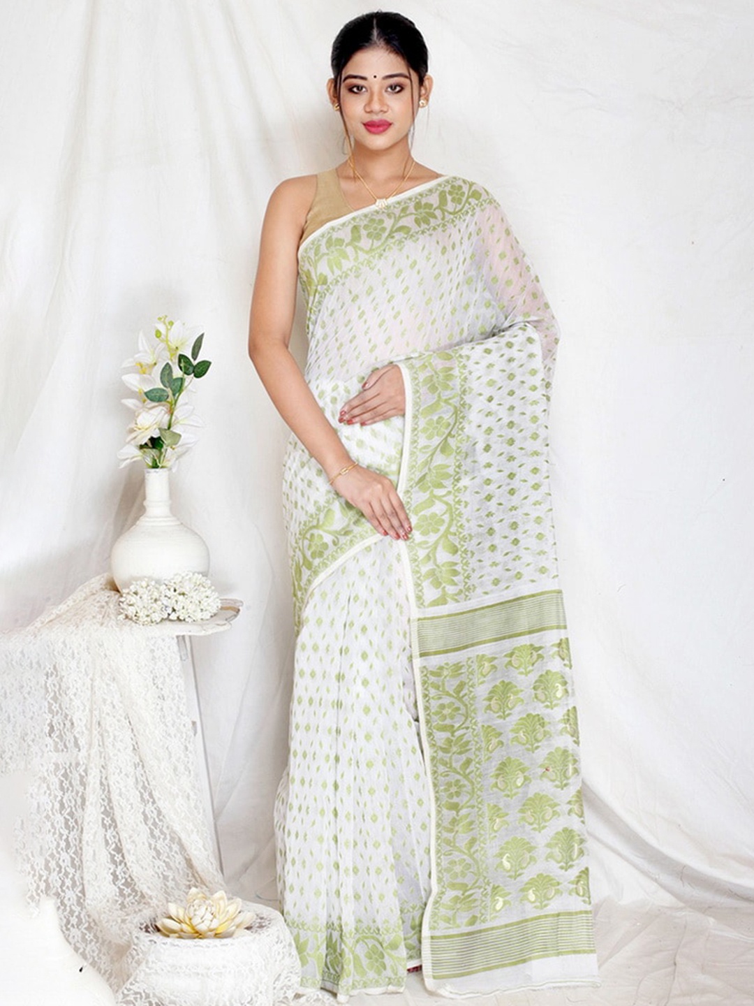 

AllSilks White & Green Ethnic Motifs Saree