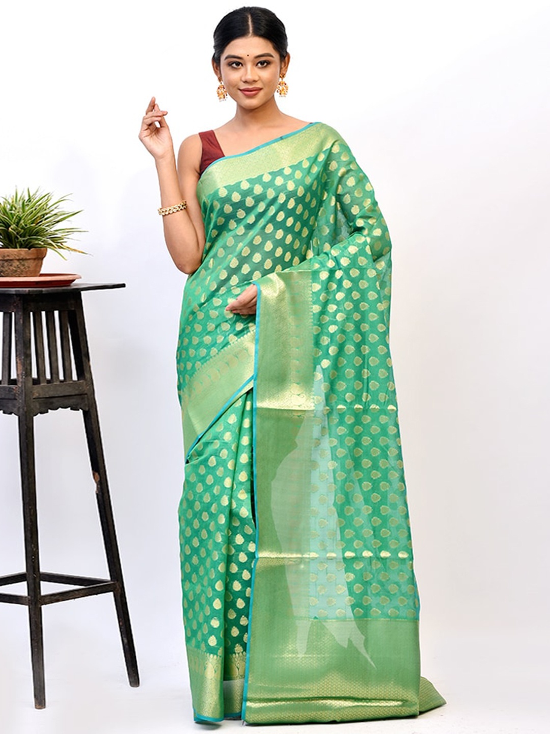 

AllSilks Green & Gold-Toned Ethnic Motifs Zari Saree