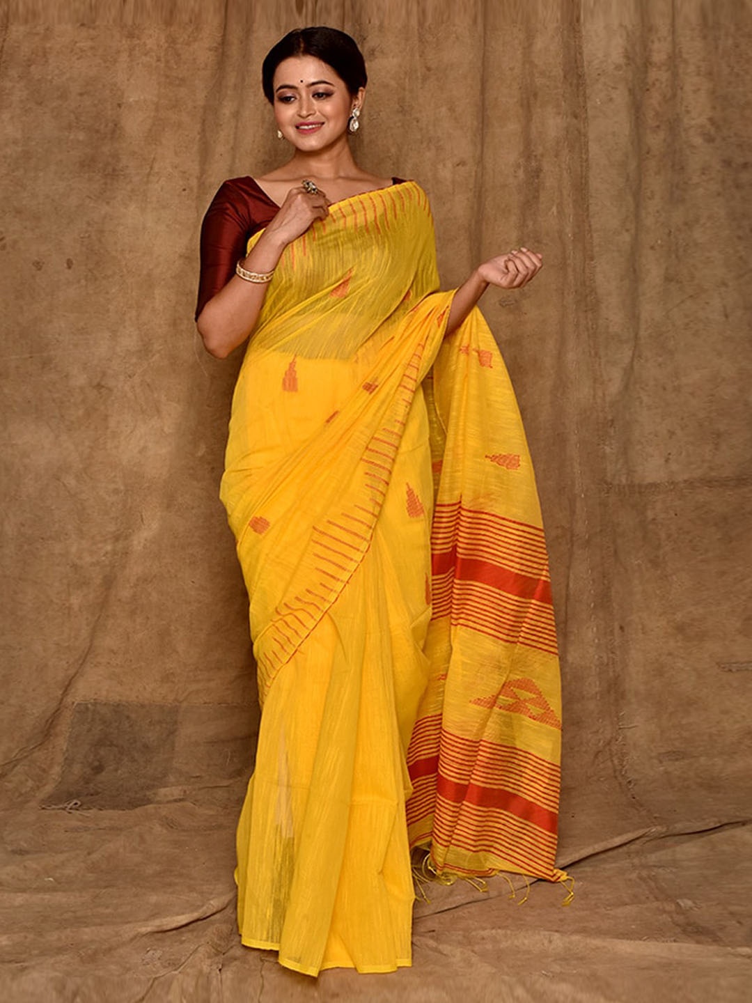 

AllSilks Yellow & Red Ethnic Motifs Saree