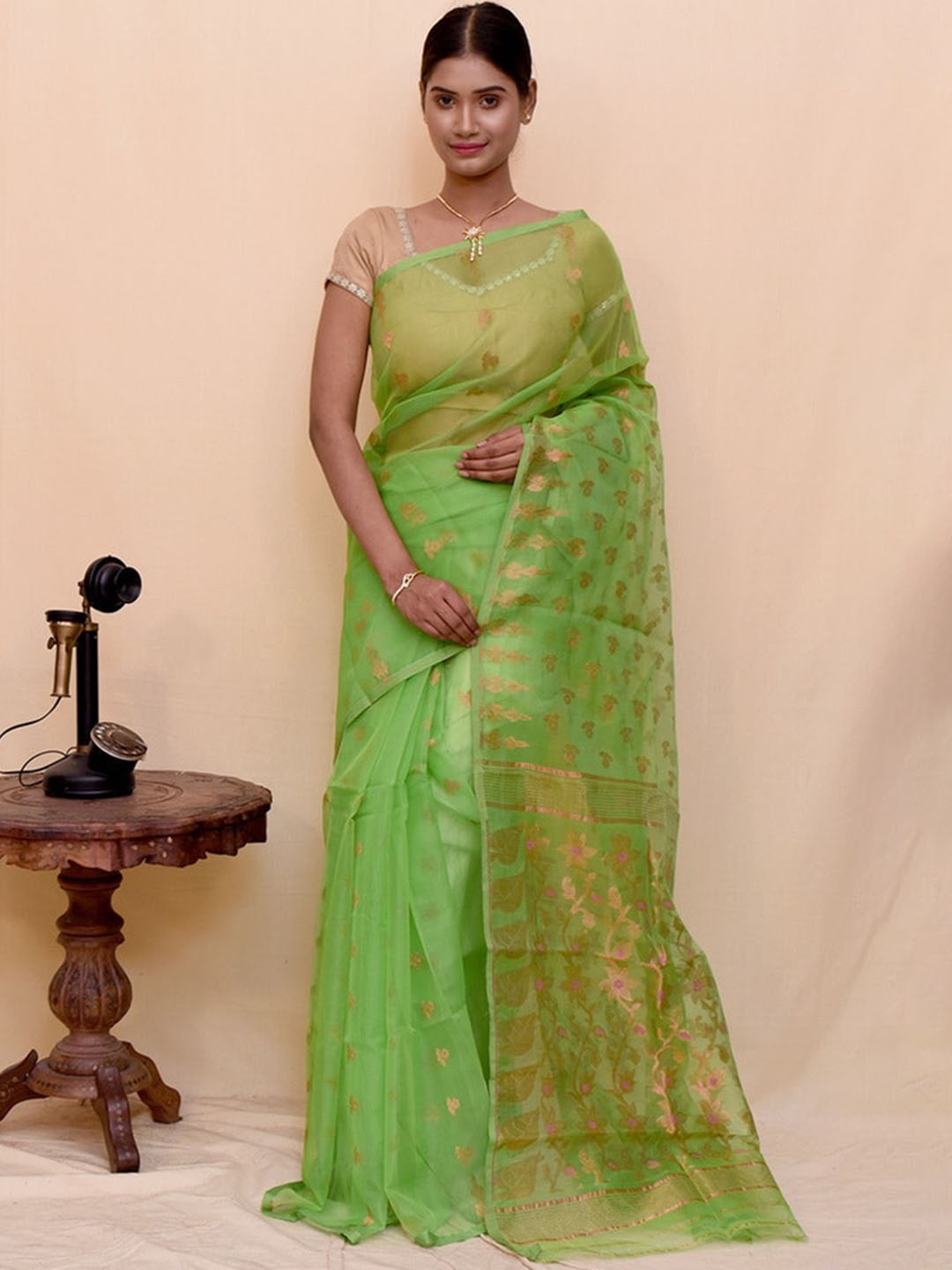 

AllSilks Green & Gold-Toned Ethnic Motifs Zari Taant Saree