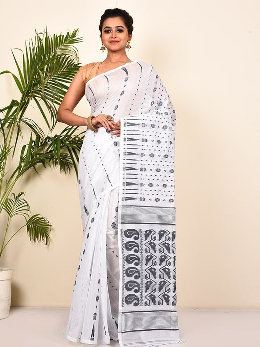 

AllSilks White & Grey Ethnic Motifs Cotton Saree