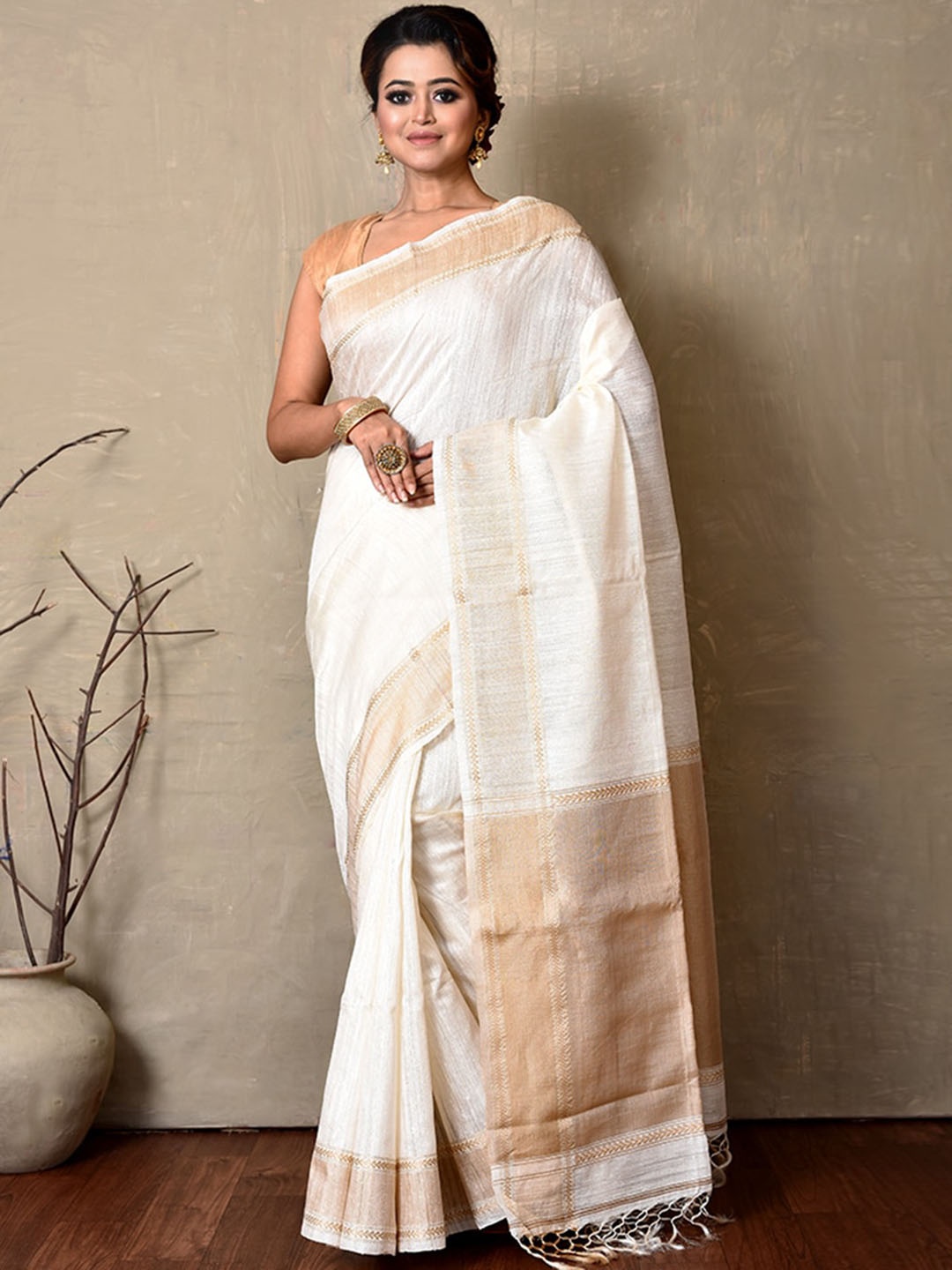 

AllSilks Cream-Coloured & Peach Zari Silk Blend Tussar Saree