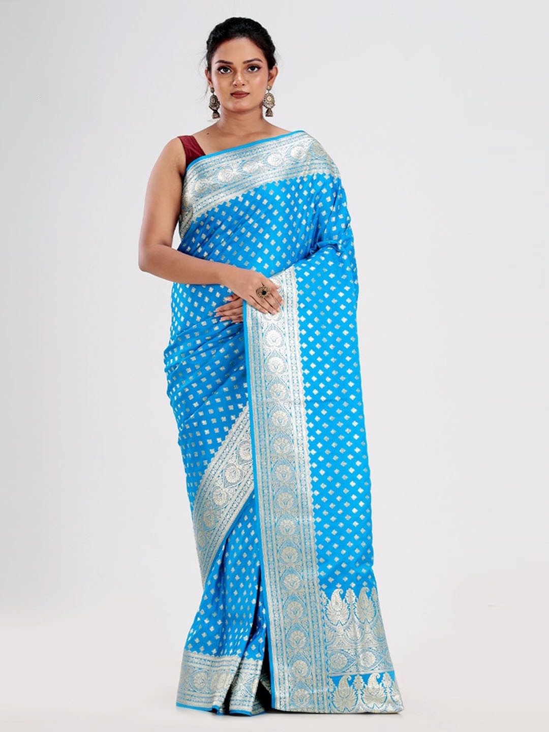 

AllSilks Blue & Silver-Toned Ethnic Motifs Zari Silk Banarasi Saree