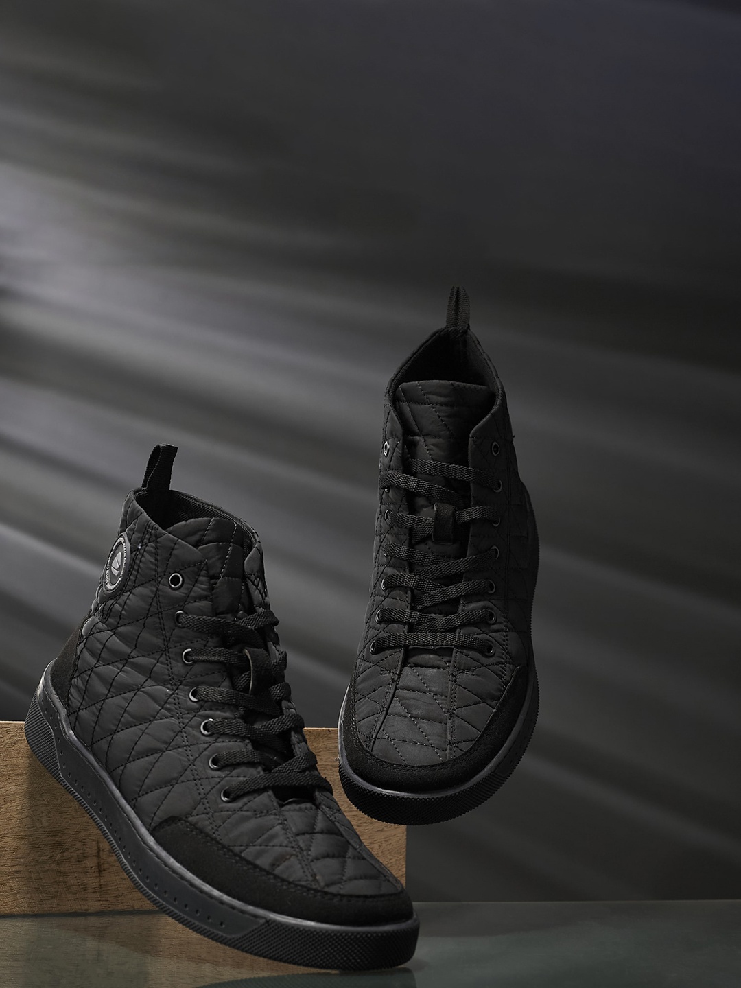 

Duke Men Black Textured High-Top Sneakers