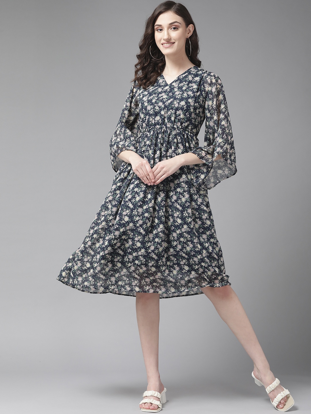 

Aarika Women Navy Blue & White Floral Print Fit & Flare Midi Dress