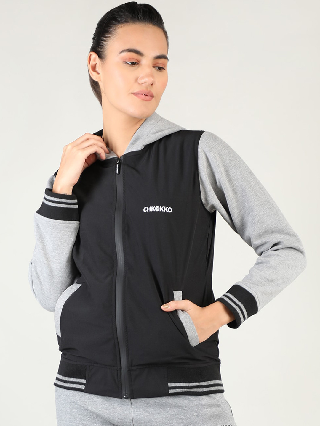 

CHKOKKO Women Black Geometric Fleece Training or Gym Bomber Patchwork Jacket