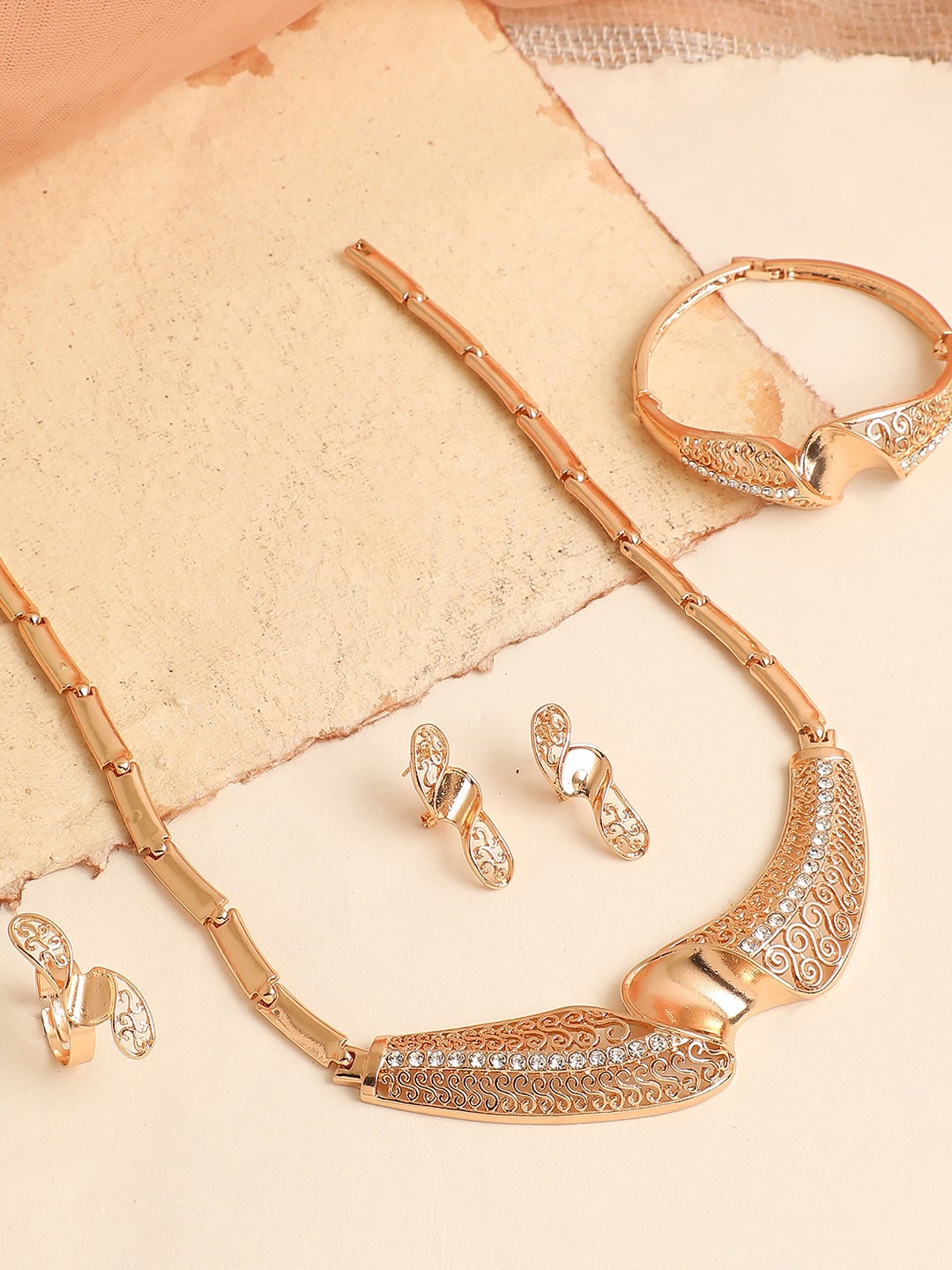 

SOHI Gold-Plated & White Artificial Stones Studded Jewellery Set