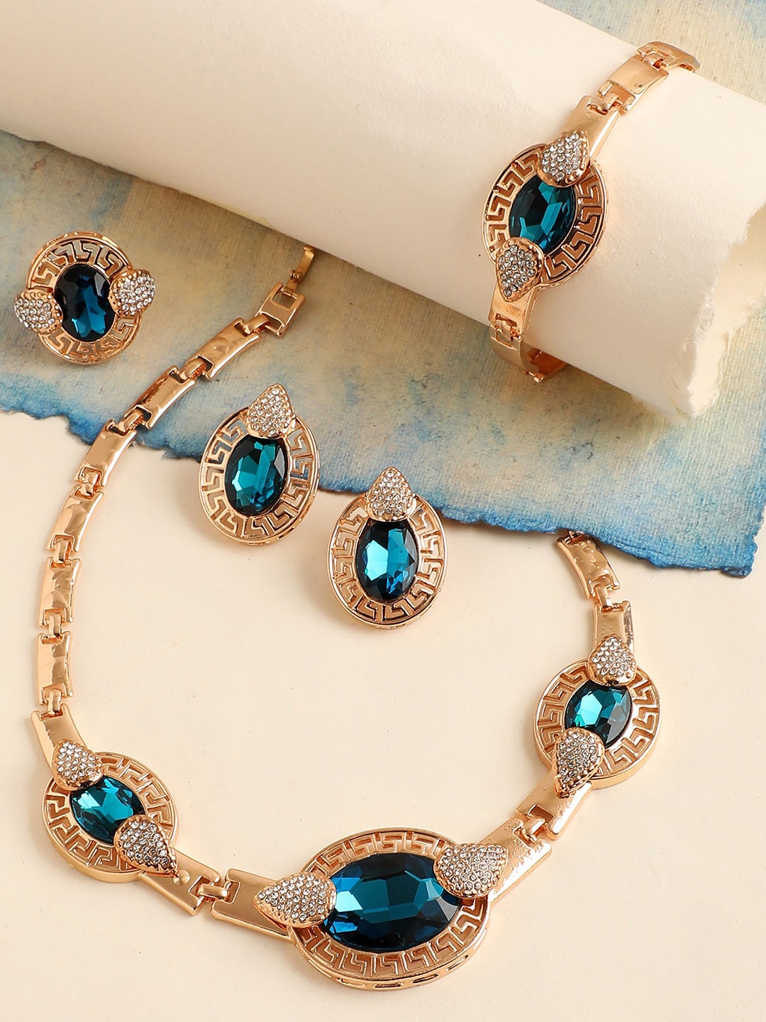 

SOHI Women Gold Plated Blue Stones-Studded Jewellery Set