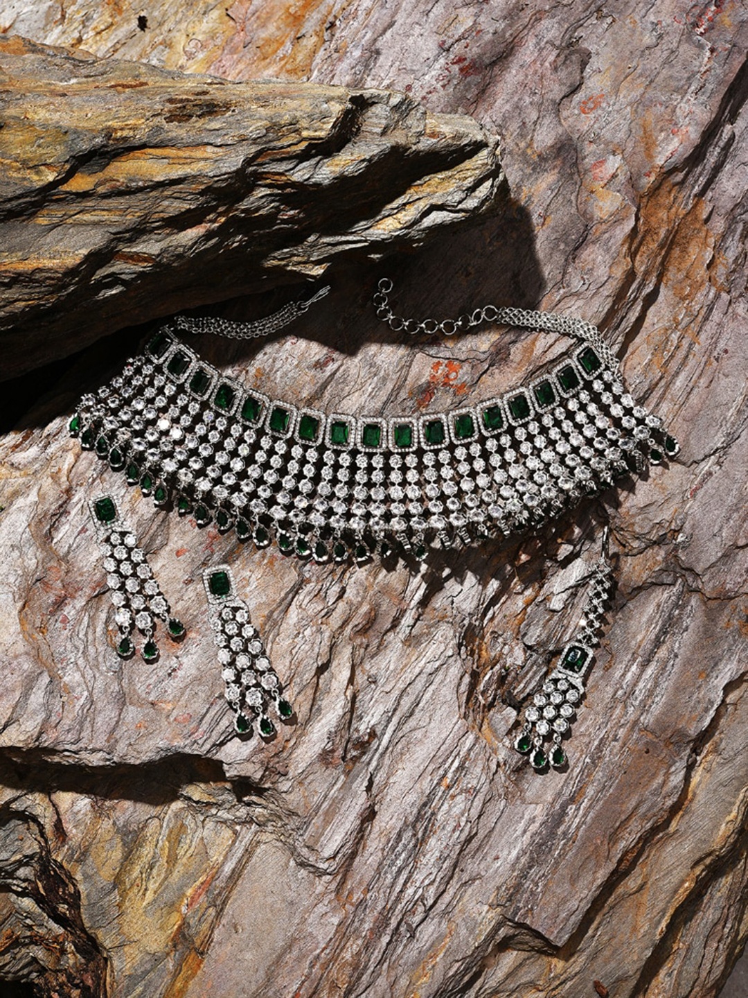 

SOHI Women Silver-Plated White & Green Stone Studded & Beaded Jewellery Set