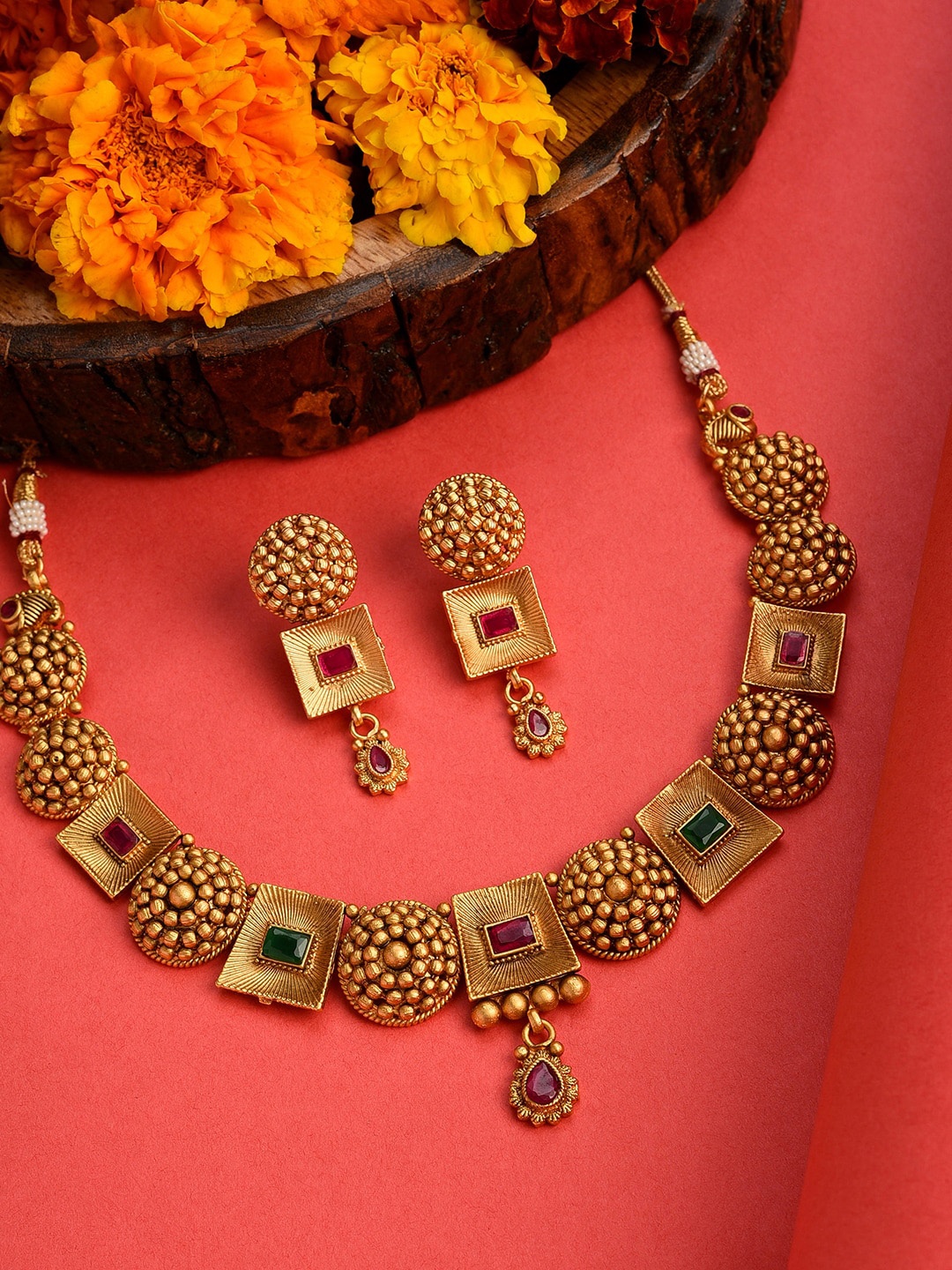 

SOHI Women Gold-Plated & Toned Pink Artificial Stones Studded Jewellery Set